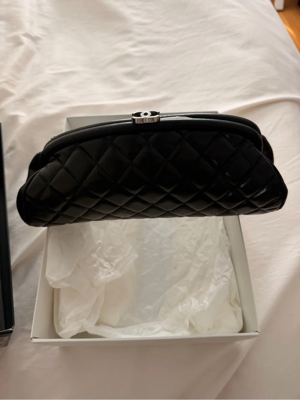 CHANEL Black Quilted Leather Kiss Lock Clutch